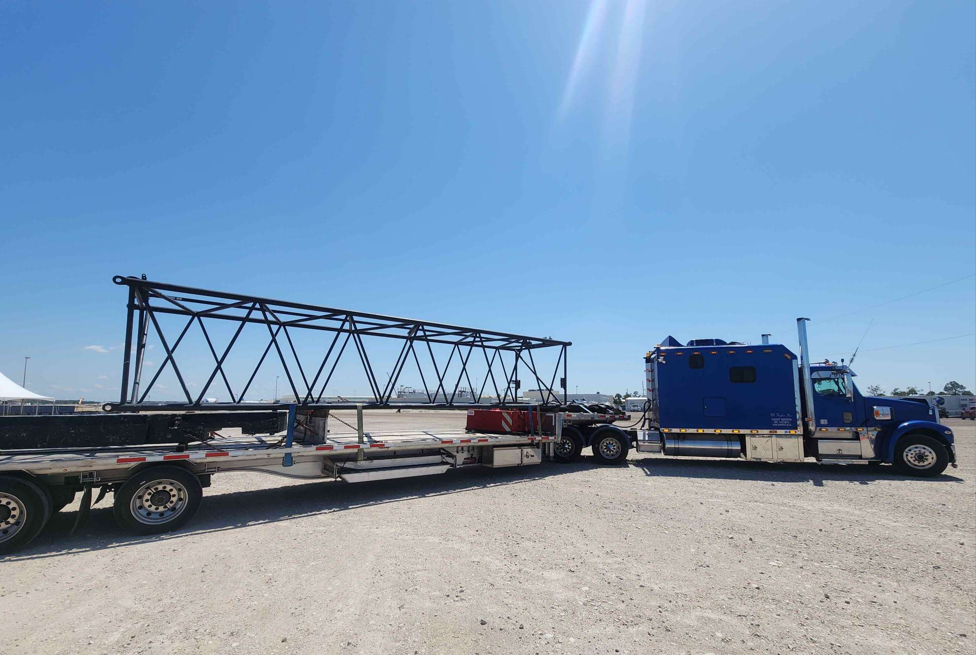 Crane shipment transported on stepdeck trailer